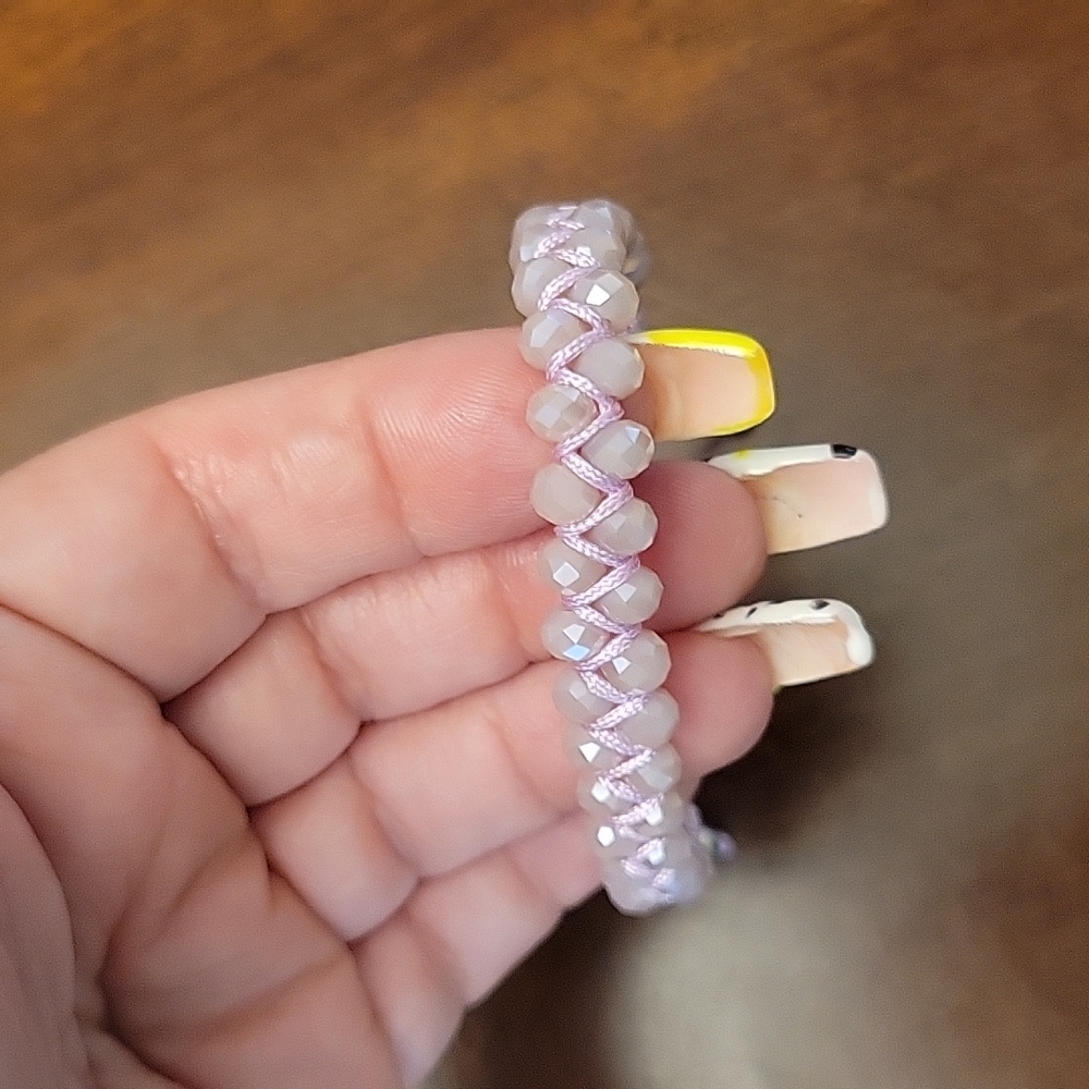 Adjustable pink beeded bracelet
